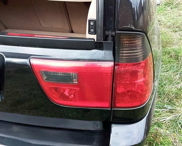 Черный БМВ Х5, объемом двигателя 3 л и пробегом 462 тыс. км за 12900 $, фото 162 на Automoto.ua