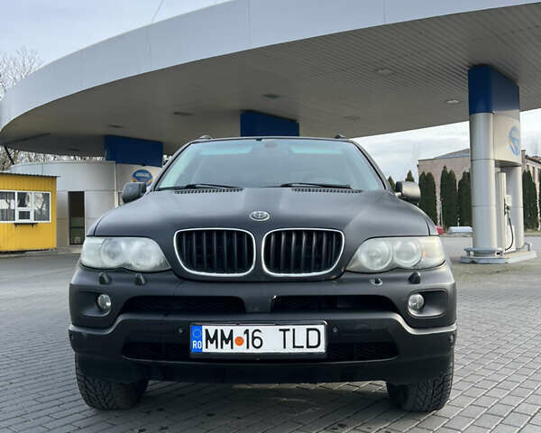 Чорний БМВ Х5, об'ємом двигуна 3 л та пробігом 300 тис. км за 4999 $, фото 4 на Automoto.ua