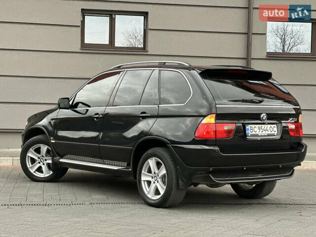 Чорний БМВ Х5, об'ємом двигуна 3 л та пробігом 304 тис. км за 10350 $, фото 28 на Automoto.ua