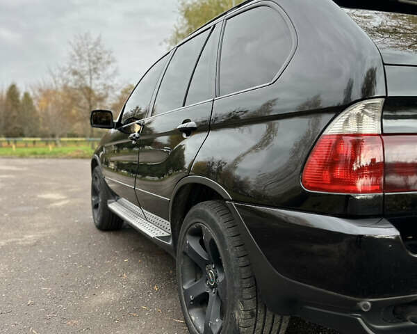 Черный БМВ Х5, объемом двигателя 3 л и пробегом 342 тыс. км за 11800 $, фото 7 на Automoto.ua