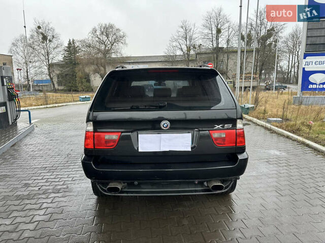 Чорний БМВ Х5, об'ємом двигуна 3 л та пробігом 320 тис. км за 5999 $, фото 4 на Automoto.ua