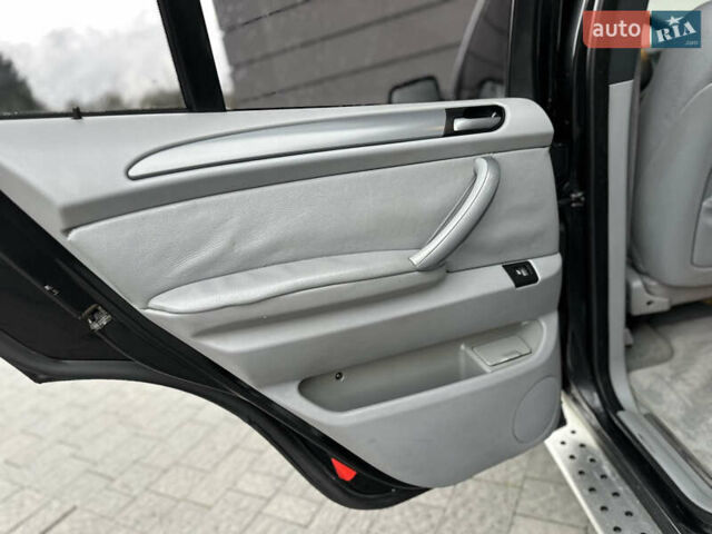 Чорний БМВ Х5, об'ємом двигуна 3 л та пробігом 304 тис. км за 10350 $, фото 77 на Automoto.ua