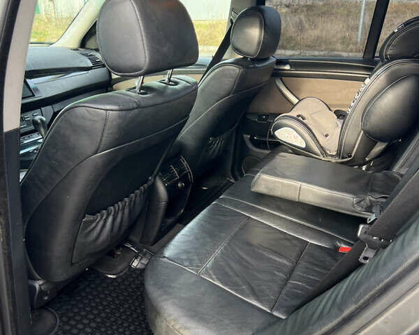Чорний БМВ Х5, об'ємом двигуна 3 л та пробігом 300 тис. км за 4999 $, фото 18 на Automoto.ua