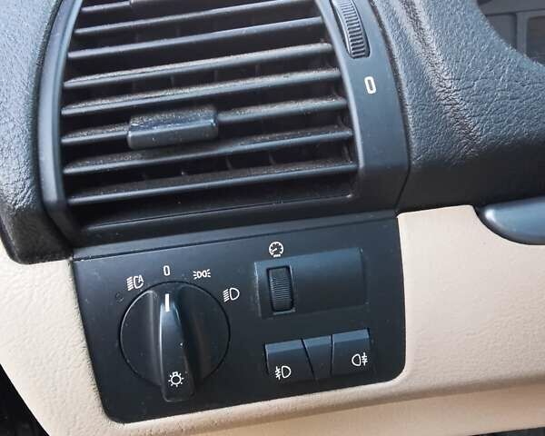 Черный БМВ Х5, объемом двигателя 3 л и пробегом 462 тыс. км за 12900 $, фото 90 на Automoto.ua