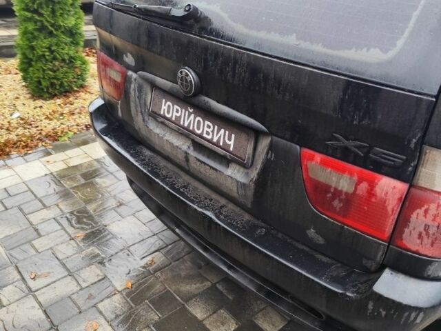 Черный БМВ Х5, объемом двигателя 3 л и пробегом 400 тыс. км за 7400 $, фото 4 на Automoto.ua