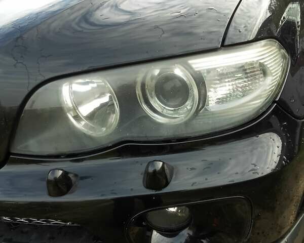 Черный БМВ Х5, объемом двигателя 3 л и пробегом 462 тыс. км за 12900 $, фото 73 на Automoto.ua