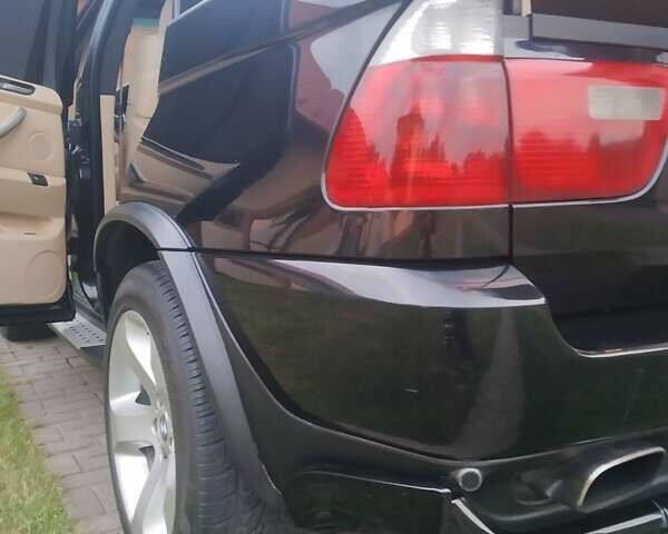 Черный БМВ Х5, объемом двигателя 3 л и пробегом 280 тыс. км за 14700 $, фото 6 на Automoto.ua