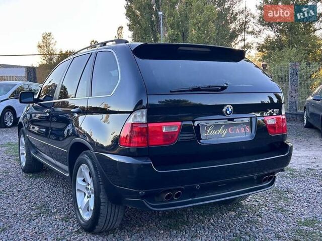 Черный БМВ Х5, объемом двигателя 4.4 л и пробегом 311 тыс. км за 9500 $, фото 6 на Automoto.ua