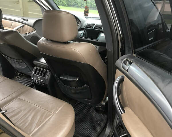 Черный БМВ Х5, объемом двигателя 3 л и пробегом 371 тыс. км за 10500 $, фото 13 на Automoto.ua