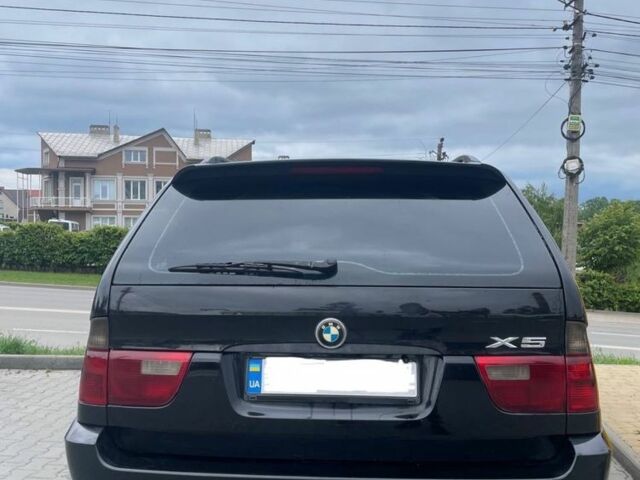Чорний БМВ Х5, об'ємом двигуна 3 л та пробігом 371 тис. км за 10500 $, фото 3 на Automoto.ua
