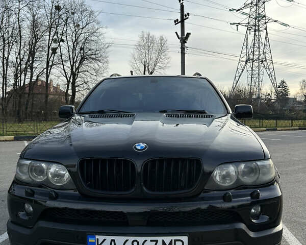 Черный БМВ Х5, объемом двигателя 4.8 л и пробегом 390 тыс. км за 12500 $, фото 1 на Automoto.ua