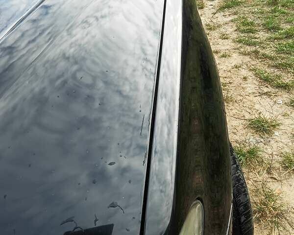 Черный БМВ Х5, объемом двигателя 3 л и пробегом 462 тыс. км за 12900 $, фото 74 на Automoto.ua