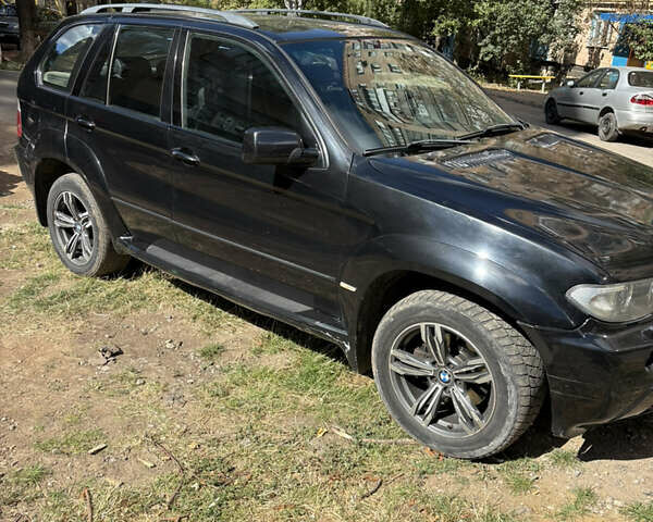 Черный БМВ Х5, объемом двигателя 3 л и пробегом 325 тыс. км за 6500 $, фото 3 на Automoto.ua