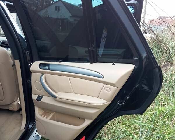 Черный БМВ Х5, объемом двигателя 3 л и пробегом 462 тыс. км за 12900 $, фото 158 на Automoto.ua