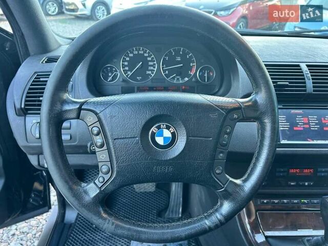 Черный БМВ Х5, объемом двигателя 4.4 л и пробегом 311 тыс. км за 9500 $, фото 17 на Automoto.ua