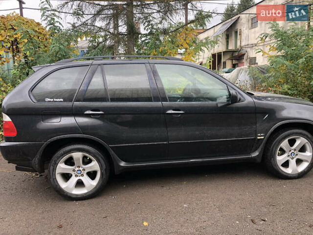 Черный БМВ Х5, объемом двигателя 4.4 л и пробегом 265 тыс. км за 9100 $, фото 4 на Automoto.ua