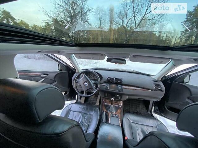 Черный БМВ Х5, объемом двигателя 4.4 л и пробегом 319 тыс. км за 9200 $, фото 15 на Automoto.ua