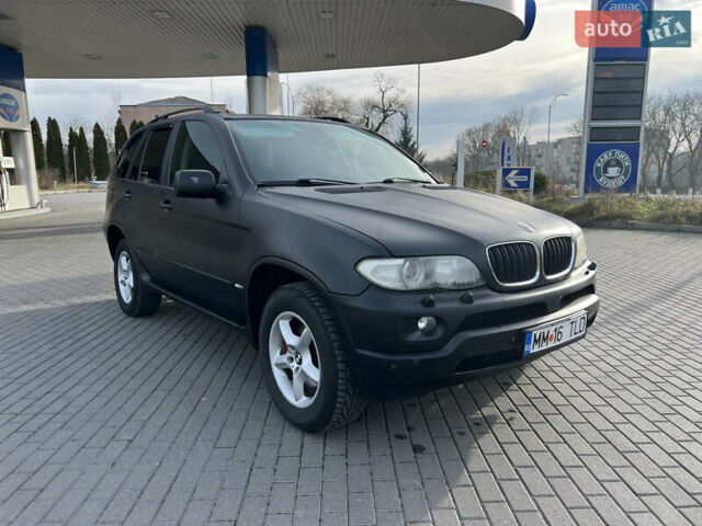 Чорний БМВ Х5, об'ємом двигуна 3 л та пробігом 300 тис. км за 4999 $, фото 7 на Automoto.ua