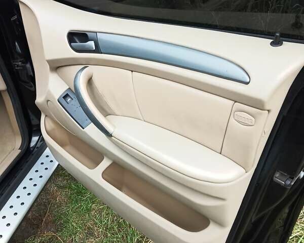 Черный БМВ Х5, объемом двигателя 3 л и пробегом 462 тыс. км за 12900 $, фото 147 на Automoto.ua