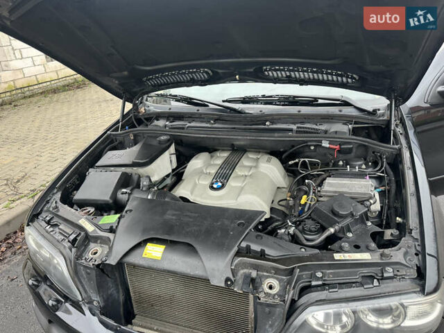 Чорний БМВ Х5, об'ємом двигуна 4.4 л та пробігом 226 тис. км за 11500 $, фото 15 на Automoto.ua