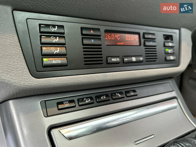 Чорний БМВ Х5, об'ємом двигуна 3 л та пробігом 304 тис. км за 10350 $, фото 50 на Automoto.ua