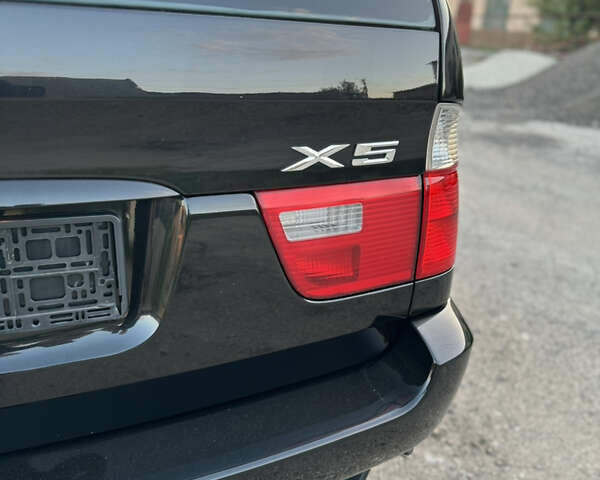 Чорний БМВ Х5, об'ємом двигуна 3 л та пробігом 320 тис. км за 12999 $, фото 6 на Automoto.ua