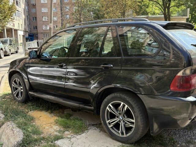 Чорний БМВ Х5, об'ємом двигуна 3 л та пробігом 325 тис. км за 6500 $, фото 4 на Automoto.ua