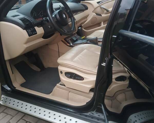 Черный БМВ Х5, объемом двигателя 3 л и пробегом 280 тыс. км за 14700 $, фото 23 на Automoto.ua