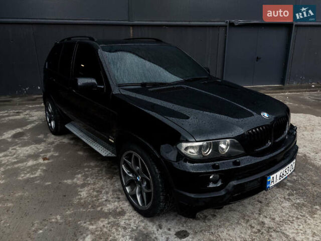 Черный БМВ Х5, объемом двигателя 3 л и пробегом 380 тыс. км за 15300 $, фото 1 на Automoto.ua