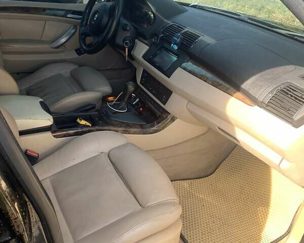 Черный БМВ Х5, объемом двигателя 3 л и пробегом 215 тыс. км за 6300 $, фото 5 на Automoto.ua