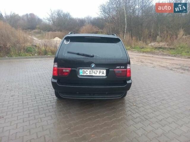 Черный БМВ Х5, объемом двигателя 3 л и пробегом 331 тыс. км за 12500 $, фото 9 на Automoto.ua