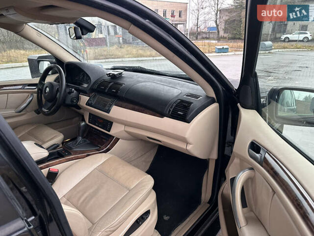 Чорний БМВ Х5, об'ємом двигуна 3 л та пробігом 320 тис. км за 5999 $, фото 13 на Automoto.ua