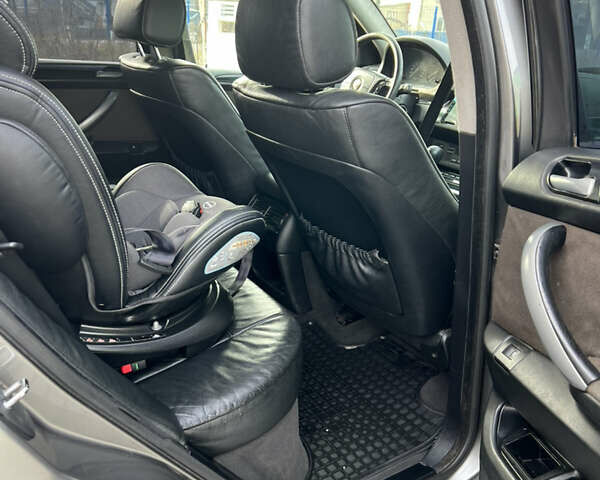 Чорний БМВ Х5, об'ємом двигуна 3 л та пробігом 300 тис. км за 4999 $, фото 22 на Automoto.ua