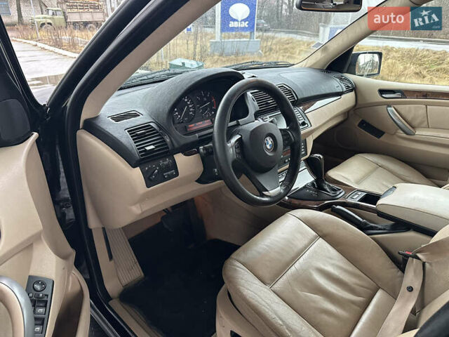 Чорний БМВ Х5, об'ємом двигуна 3 л та пробігом 320 тис. км за 5999 $, фото 8 на Automoto.ua