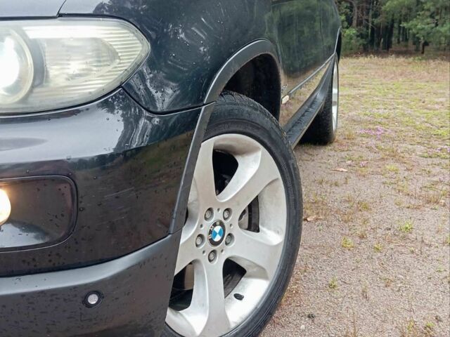 Чорний БМВ Х5, об'ємом двигуна 3 л та пробігом 400 тис. км за 5999 $, фото 4 на Automoto.ua