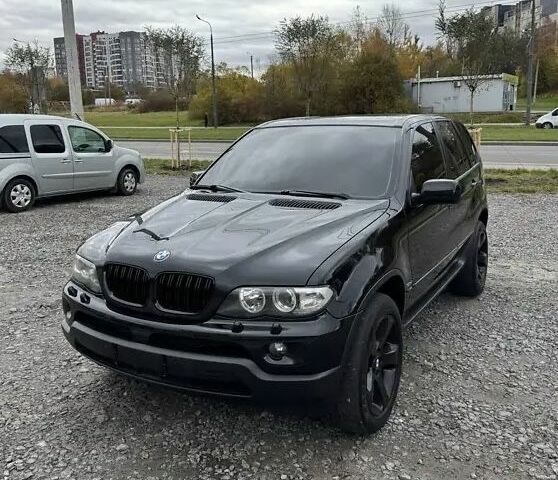 Чорний БМВ Х5, об'ємом двигуна 3 л та пробігом 315 тис. км за 11499 $, фото 1 на Automoto.ua