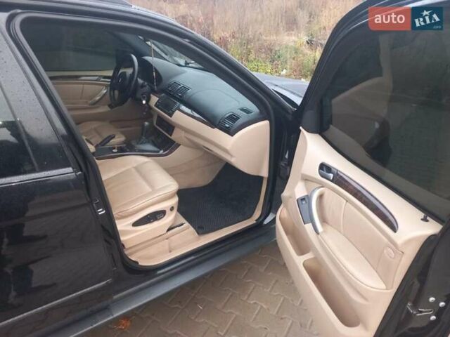 Черный БМВ Х5, объемом двигателя 3 л и пробегом 331 тыс. км за 12500 $, фото 25 на Automoto.ua