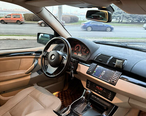 Черный БМВ Х5, объемом двигателя 3 л и пробегом 370 тыс. км за 11999 $, фото 6 на Automoto.ua