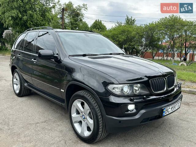 Черный БМВ Х5, объемом двигателя 2.99 л и пробегом 319 тыс. км за 12977 $, фото 2 на Automoto.ua