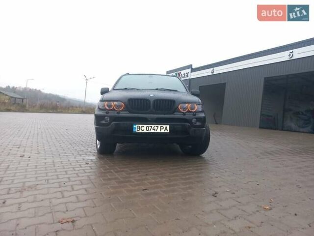 Черный БМВ Х5, объемом двигателя 3 л и пробегом 331 тыс. км за 12500 $, фото 8 на Automoto.ua