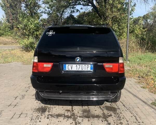 Черный БМВ Х5, объемом двигателя 3 л и пробегом 215 тыс. км за 6300 $, фото 2 на Automoto.ua