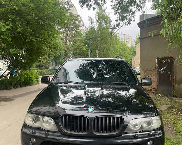 Черный БМВ Х5, объемом двигателя 3 л и пробегом 371 тыс. км за 10500 $, фото 1 на Automoto.ua