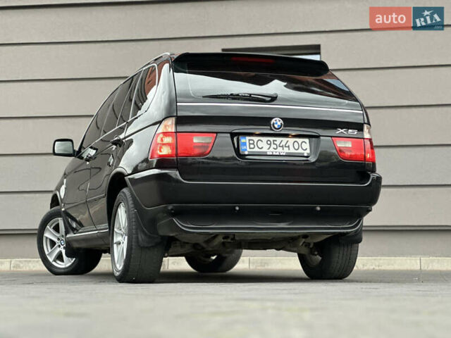 Чорний БМВ Х5, об'ємом двигуна 3 л та пробігом 304 тис. км за 10350 $, фото 32 на Automoto.ua