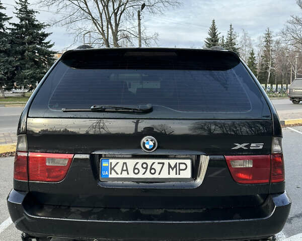 Черный БМВ Х5, объемом двигателя 4.8 л и пробегом 390 тыс. км за 12500 $, фото 4 на Automoto.ua