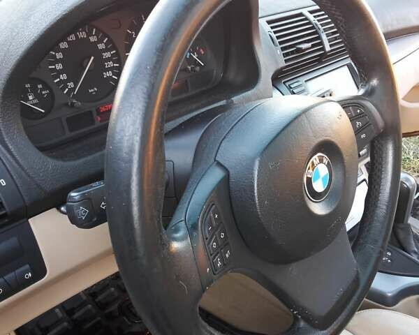 Черный БМВ Х5, объемом двигателя 3 л и пробегом 462 тыс. км за 12900 $, фото 92 на Automoto.ua