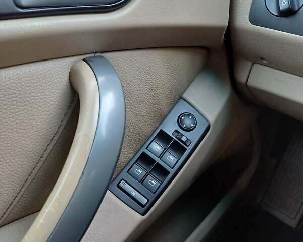 Черный БМВ Х5, объемом двигателя 3 л и пробегом 280 тыс. км за 14700 $, фото 64 на Automoto.ua