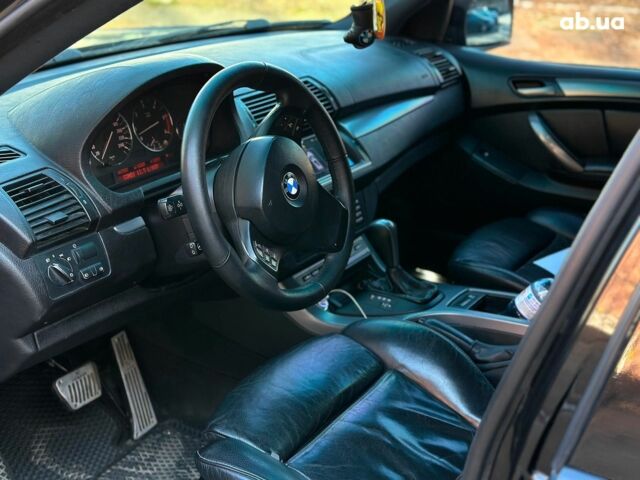 Чорний БМВ Х5, об'ємом двигуна 3 л та пробігом 478 тис. км за 11990 $, фото 29 на Automoto.ua