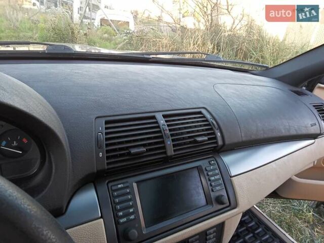 Черный БМВ Х5, объемом двигателя 3 л и пробегом 462 тыс. км за 12900 $, фото 85 на Automoto.ua