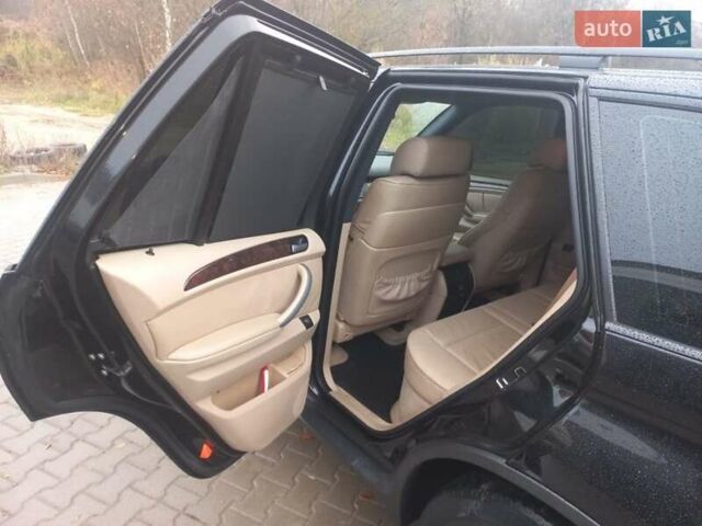 Черный БМВ Х5, объемом двигателя 3 л и пробегом 331 тыс. км за 12500 $, фото 18 на Automoto.ua
