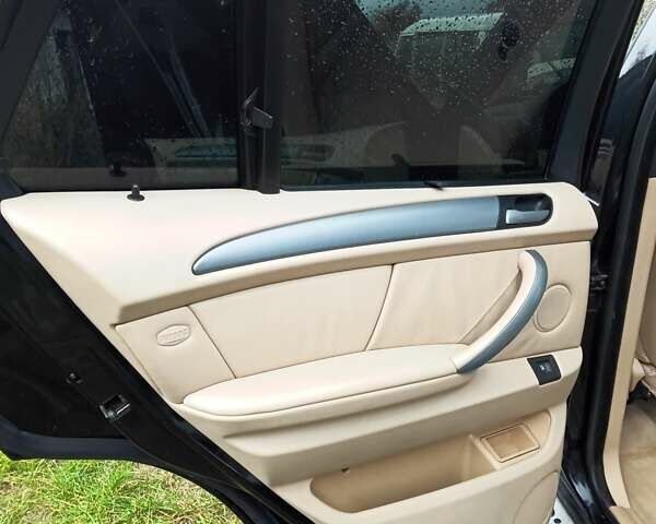 Черный БМВ Х5, объемом двигателя 3 л и пробегом 462 тыс. км за 12900 $, фото 129 на Automoto.ua